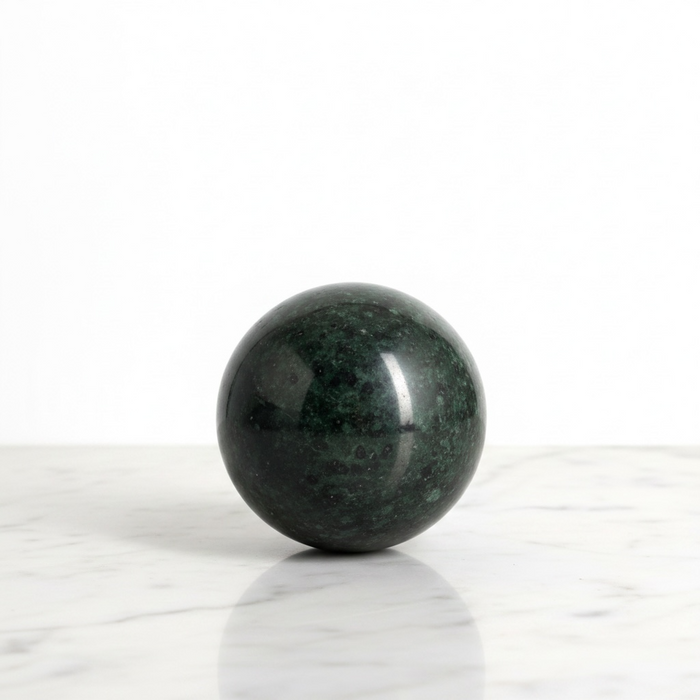 Natural nephrite jade polished sphere 254g, 5.6cm diameter, in deep earthy green with waxy lustre, for luck, abundance and heart chakra healing