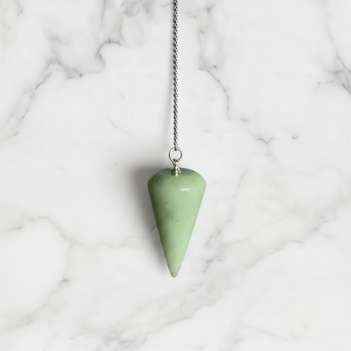 A rounded edge jade pendulum with a silver chain and a loop at the top for hanging.