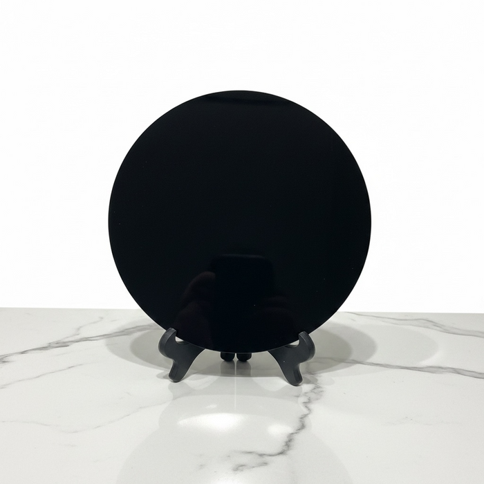Kindred Crystal Collective — Obsidian Mirror, round polished black obsidian scrying mirror on black easel stand, white background