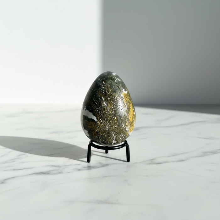 Kindred Crystal Collective — Ocean Jasper Egg, polished green and golden-yellow ocean jasper egg with orbicular spotting
