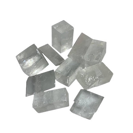 Kindred Crystal Collective — Optical Calcite Tumbled 2–3cm, naturally transparent Iceland Spar optical calcite tumbled stone showing birefringence on white background