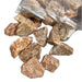 Kindred Crystal Collective — Orchid Calcite Rough 1KG, soft peach and lavender raw calcite chunks spilling from a clear bag on white background.