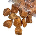 Kindred Crystal Collective — Orchid Calcite Rough 1KG AA+ Grade, soft peach and lavender raw calcite chunks spilling from a clear bag on white background.

