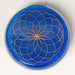 Kindred Crystal Collective — Orgonite Energy Charging Plate, handcrafted cobalt blue resin plate with copper Flower of Life design and silver glitter rim, top view