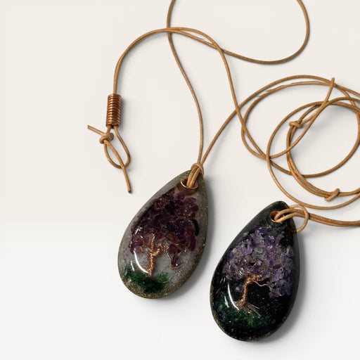 Kindred Crystal Collective - Handcrafted orgonite Tree of Life teardrop pendant with genuine crystal chips and copper Tree of Life design encased in resin, on adjustable waxed cord