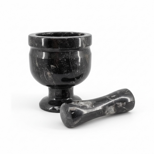Kindred Crystal Collective — Orthoceras Mortar and Pestle, dark fossil stone mortar and pestle with ancient orthoceras fossil impressions on white background