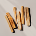 Kindred Crystal Collective — Palo Santo Natural Wood Incense stick, close-up of pale wood grain and natural cut ends.
