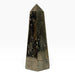 Kindred Crystal Collective — Pyrite Obelisk, brass-gold metallic crystal tower with smooth faces, textured pockets and a pointed tip.