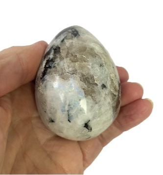 Natural rainbow moonstone polished egg 194g showing ethereal blue adularescence, for new beginnings, intuition, protection and emotional calm
