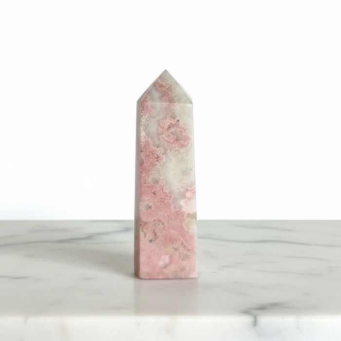 Rhodonite crystal tower 107g showing striking pink and black contrast, a Peruvian rhodonite obelisk for heart chakra and grounding