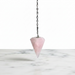 Natural rose quartz faceted pendulum in soft pink, used for dowsing, heart chakra healing and self-love