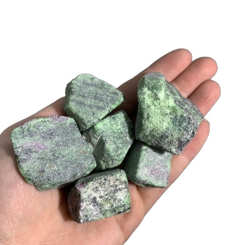 Kindred Crystal Collective — Ruby Zoisite Rough 1KG, small raw green and ruby zoisite chunks held in an open hand showing natural size 3-4cm

