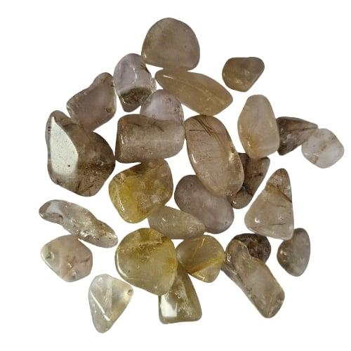 Kindred Crystal Collective — Rutilated Quartz Tumbled 2–3cm, group of polished clear to smoky quartz stones with golden rutile needle inclusions on white background