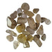 Kindred Crystal Collective — Rutilated Quartz Tumbled 2–3cm, group of polished clear to smoky quartz stones with golden rutile needle inclusions on white background