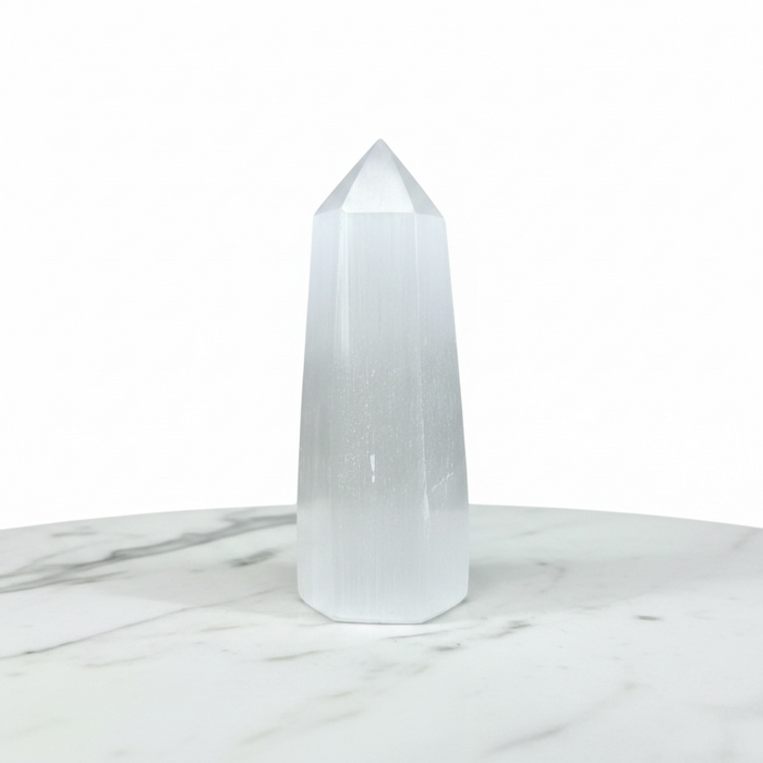 Natural selenite obelisk 15cm in translucent white with silky striations, a crystal tower for energy cleansing and spiritual clarity