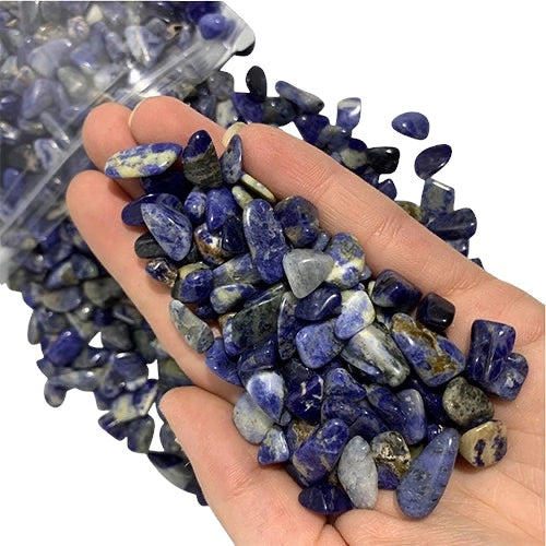 Kindred Crystal Collective — Sodalite Chips 500g, deep blue sodalite chips with white calcite veining in a clear bag on white background