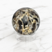 Kindred Crystal Collective — Sphalerite Sphere, natural sphalerite polished sphere in warm amber and honey tones with exceptional refractive brilliance, 70mm