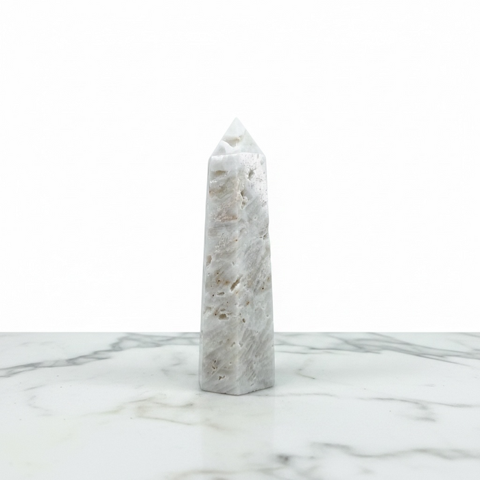 Kindred Crystal Collective — Sphalerite White Generator, polished pale ivory sphalerite generator point with granular surface detail, variant 3