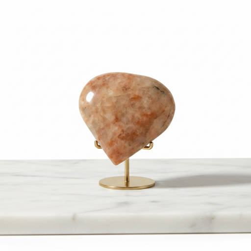 Natural sunstone carved crystal heart in warm reddish-orange with glittering aventurescence, 82g, for vitality and good fortune