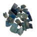Kindred Crystal Collective — Trolleite Tumbled 3.5–4.5cm, pile of large polished blue-grey and teal trolleite fragments with deep navy and golden-brown inclusions on white background