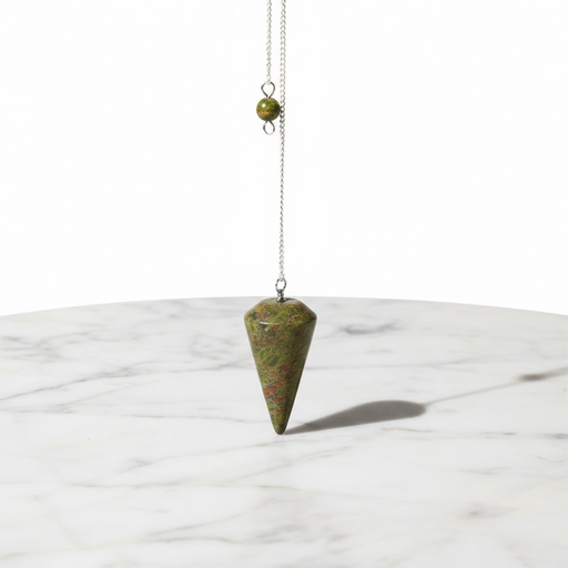 Natural unakite faceted pendulum with mottled green and pink tones, used for dowsing and heart chakra healing