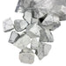 Kindred Crystal Collective — White Howlite Rough 1KG, white and grey veined raw howlite chunks spilling from a clear bag on white background.
