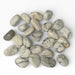 Kindred Crystal Collective — White Howlite Tumbled Stones, pile of polished white Howlite tumbles showing white to pale grey base with bold dark grey-black veining and smooth rounded form, white background