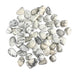 Kindred Crystal Collective — Howlite Tumbled 1.5–2cm, large pile of small polished opaque white stones with distinctive grey-black veining on white background