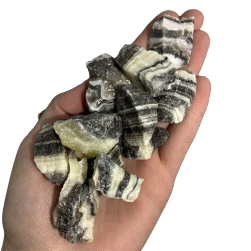 Kindred Crystal Collective — Zebra Calcite Rough 1KG, larger 2–3.5cm calcite pieces with creamy white, beige and soft grey banding.