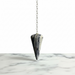 Zebra Jasper Pendulum crystal on white background  distinctive black and white striped pattern