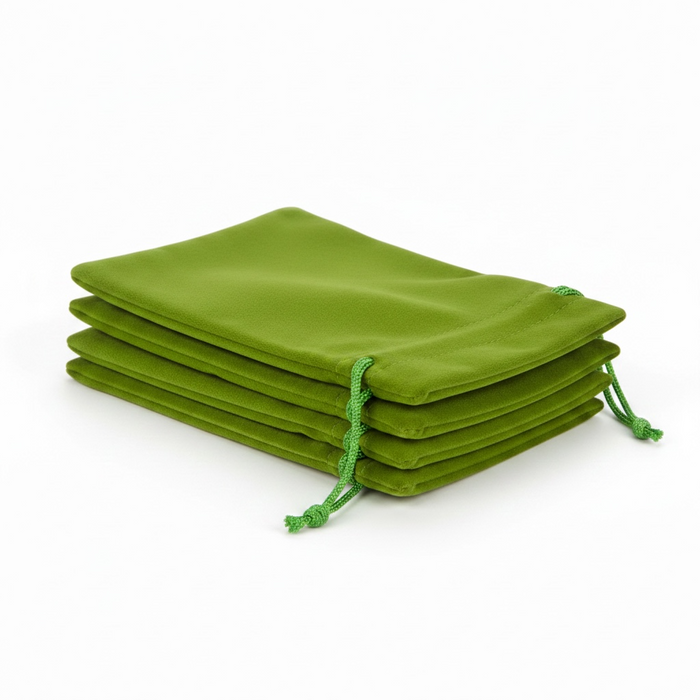 Stack of green drawstring bags on a white background