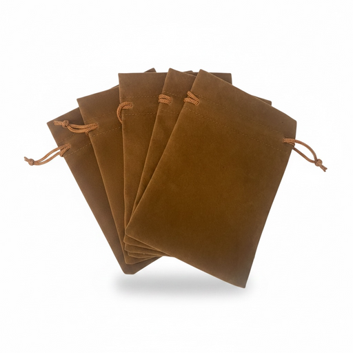 Set of brown velvet drawstring bags on a white background