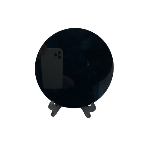 Kindred Crystal Collective — Obsidian Mirror, round polished black obsidian scrying mirror on black easel stand, white background