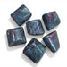 Kindred Crystal Collective — Ruby Kyanite Tumbled, deep red ruby and vivid blue kyanite natural tumbled stone on white background