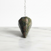 Unakite Pendulum - Pink Based crystal on white background distinctive pink and green tones