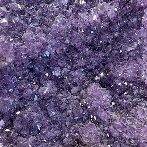 Kindred Crystal Collective — Amethyst Cluster, close-up detail of natural amethyst crystal terminations showing rich violet colouring and geometric formations