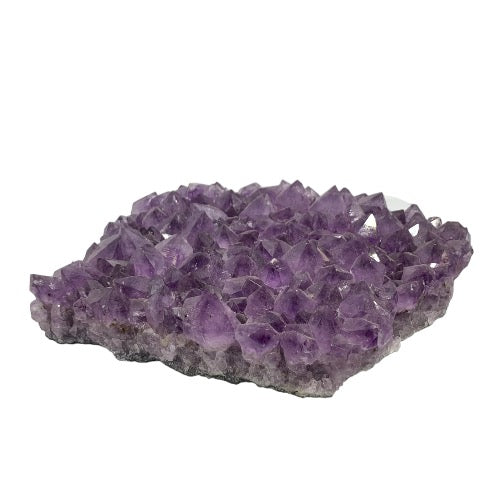 Kindred Crystal Collective — Amethyst Cluster, side view of large natural amethyst cluster showing crystal point depth and natural matrix base