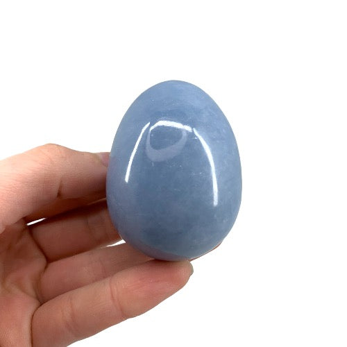Natural angelite polished egg 147g in soft powder blue, 5cm, for peace, compassion and angelic connection