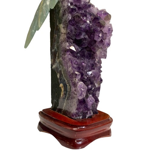 Kindred Crystal Collective — Blue Onyx Parrot on Amethyst Cluster, close-up of deep purple amethyst cluster column on polished timber base