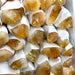 Kindred Crystal Collective — Citrine Rough Point Boxed, close-up detail of raw citrine termination and translucent golden quartz formation