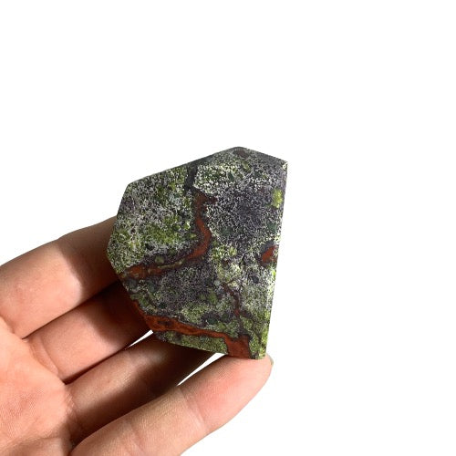 Kindred Crystal Collective — Dragon Blood Jasper Free Form, medium polished green and red dragon blood jasper freeform with raw base, size reference with hand