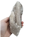 Elestial quartz close-up revealing complex hollow stepped depressions and branching crystal formations, a rare window quartz for spiritual awareness