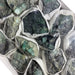 Kindred Crystal Collective — Emerald Rough Box, close-up detail of natural emerald rough showing hexagonal crystal structure and rich saturated green colouring