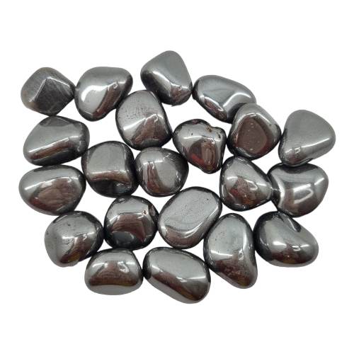 Kindred Crystal Collective — Hematite Tumbled 1.5–2cm, large group of polished metallic silver-grey hematite stones with mirror-like finish on white background