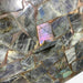 Kindred Crystal Collective — Labradorite Tile Purple Flash, close-up detail of rare purple labradorescence across polished labradorite feldspar surface