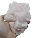 Mangano calcite raw specimen glowing vibrant fluorescent pink under UV light, a UV-reactive pink crystal for heart-centred energy and mineral collections