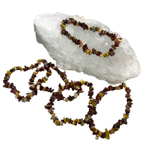 Kindred Crystal Collective — Mookaite Chip Bracelets (Pack of 5), irregular polished stone chips in earthy burgundy, mustard yellow, brown and cream tones.