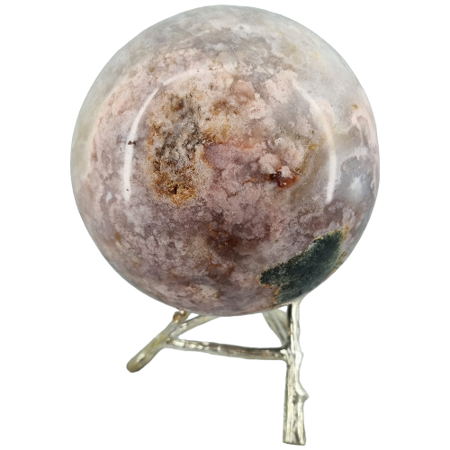 Pink amethyst sphere close-up showing natural blush pink tones and druzy crystal formations, a rare Patagonian crystal statement piece for love and empowerment