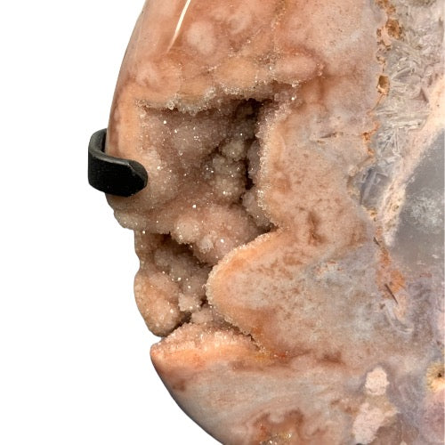 Pink amethyst teardrop close-up showing sparkling blush pink druzy crystals in elegant teardrop form, a rare Patagonian crystal statement piece for love and empowerment