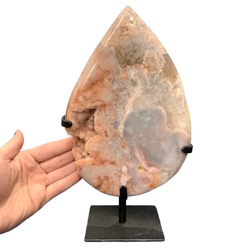 Pink amethyst teardrop close-up showing sparkling blush pink druzy crystals in elegant teardrop form, a rare Patagonian crystal statement piece for love and empowerment